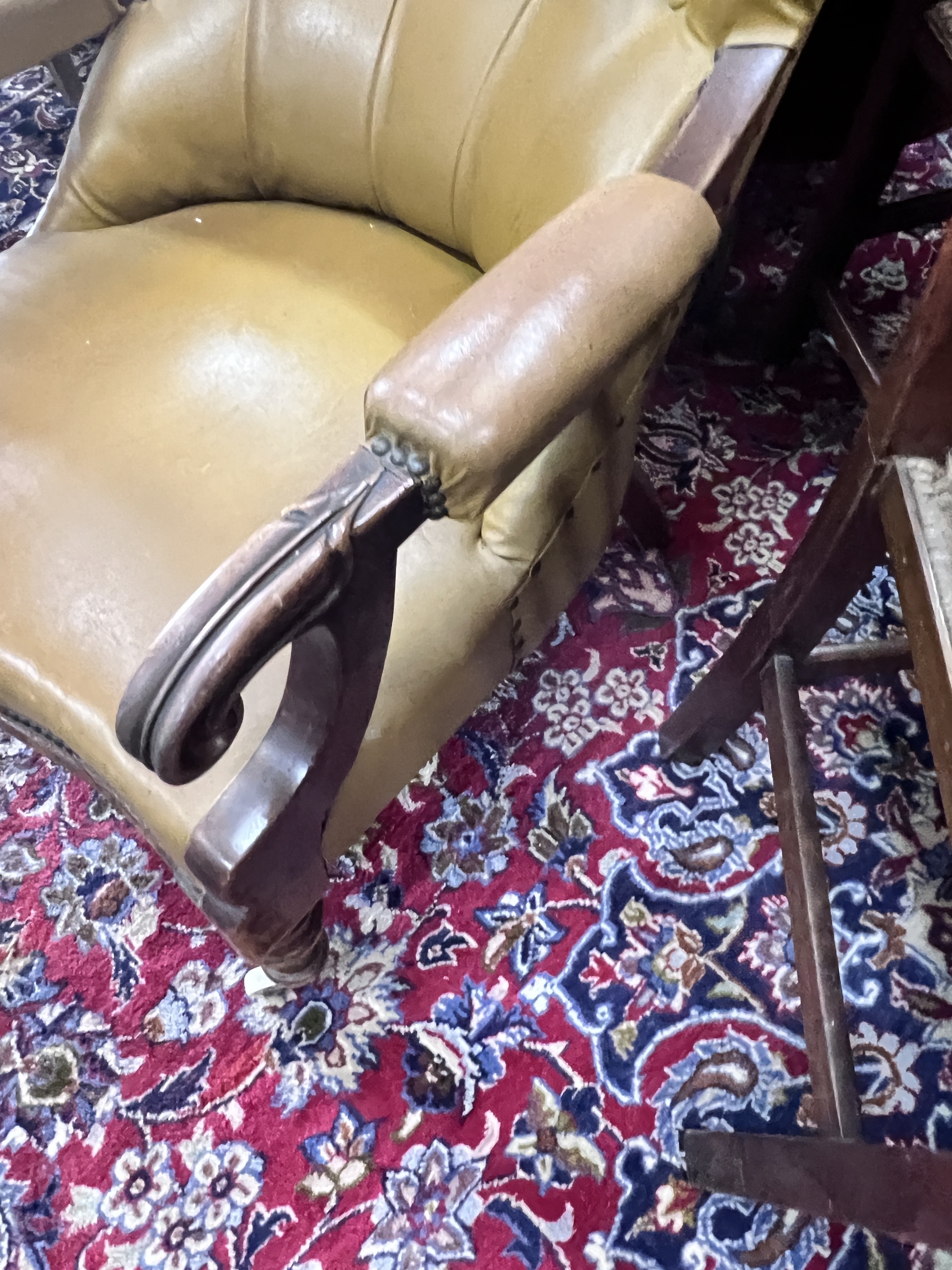 A Victorian mahogany spoonback open armchair, width 63cm, height 84cm